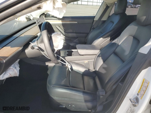 2021 Tesla Model 3 Standard Range Plus with VIN 5YJ3E1EA8MF074974, listed as a Copart auction lot 49626135 with 60,778 mi miles and Salvage Title. Bid and sale history available at carsss.com. Image 7.