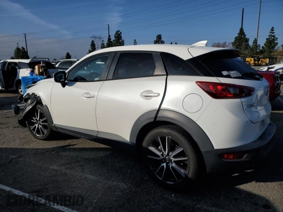 2018 Mazda CX-3 Touring with VIN JM1DKDC77J0318422, listed as a Copart auction lot 44514825 with 54,846 mi miles and Salvage Title. Bid and sale history available at carsss.com. Image 2.