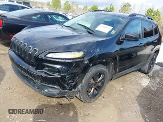 2017 Jeep Cherokee Altitude with VIN 1C4PJLAB7HW660624, listed as a IAAI auction lot 41488683 with 106,963 mi miles and . Bid and sale history available at DreamBid. Image 2.