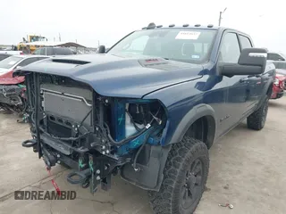 2024 Ram 2500 Power Wagon z VIN 3C6TR5EJ0RG315687, wystawiony jako IAAI lot #41614637 z przebiegiem 10 933 mil mil oraz . Historia ofert i sprzedaży dostępna na DreamBid. Obrazek 2.