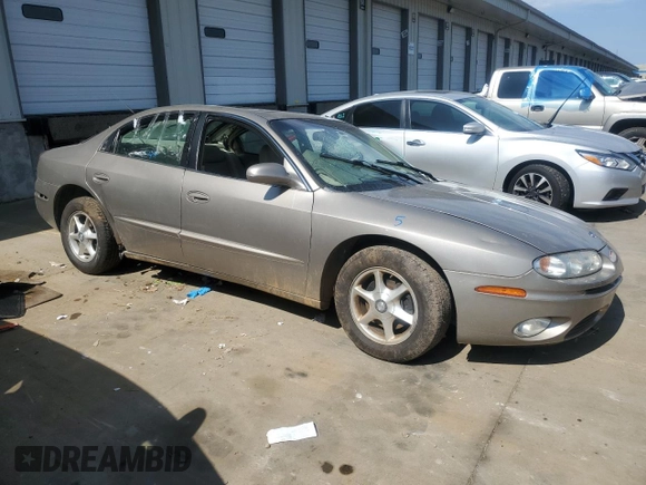 2002 Oldsmobile Aurora z VIN 1G3GR64H424238288, wystawiony jako Copart lot #68086014 z przebiegiem 97 232 mil mil oraz Szkody całkowita. Historia ofert i sprzedaży dostępna na DreamBid. Obrazek 4.