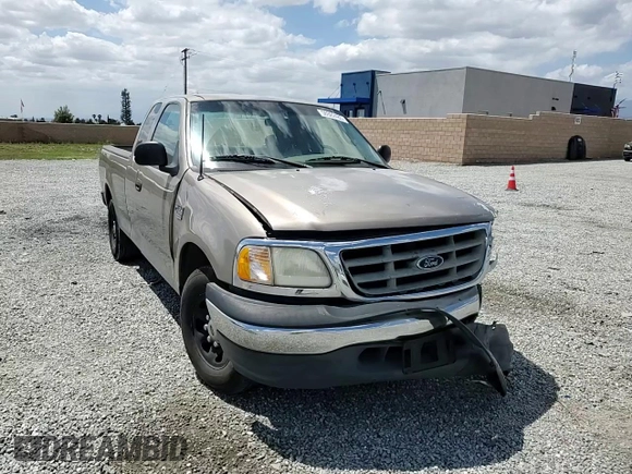 2001 Ford F-150 with VIN 1FTPX17L21NA37619, listed as a Copart auction lot 56922485 with 212,148 mi miles and Salvage title. Bid and sale history available at DreamBid. Image 14.