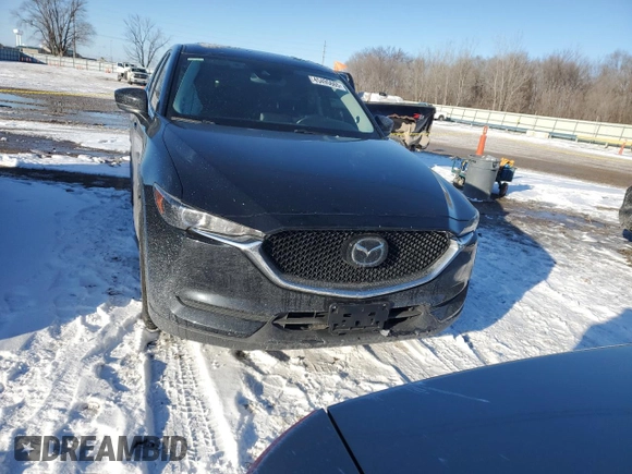 2020 Mazda CX-5 Touring with VIN JM3KFBCMXL1757348, listed as a Copart auction lot 45495665 with 79,890 mi miles and Salvage Title. Bid and sale history available at carsss.com. Image 5.