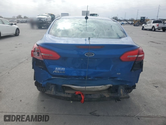 2018 Ford Focus SE z VIN 1FADP3F22JL328761, wystawiony jako Copart lot #45220705 z przebiegiem 71 639 mil mil oraz Szkoda całkowita • Salvage title. Historia ofert i sprzedaży dostępna na DreamBid. Obrazek 6.