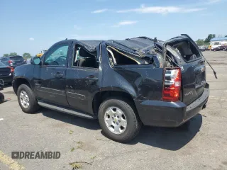 2011 Chevrolet Tahoe LS with VIN 1GNSCAE06BR294850, listed as a Copart auction lot 62103275 with 144,488 mi miles and Salvage title. Bid and sale history available at DreamBid. Image 2.