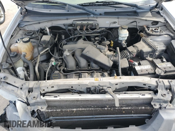 2006 Ford Escape XLT with VIN 1FMYU03146KC34615, listed as a Copart auction lot 55096195 with 144,398 mi miles and Salvage Title. Bid and sale history available at DreamBid. Image 12.
