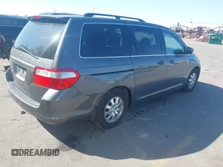 2007 Honda Odyssey EX-L with VIN 5FNRL38777B140916, listed as a IAAI auction lot 42159976 with 167,541 mi miles. Bid and sale history available at carsss.com. Image 4.