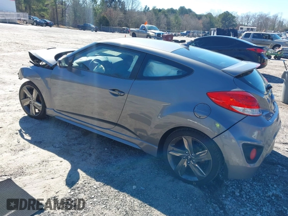2015 Hyundai Veloster Turbo with VIN KMHTC6AE8FU229198, listed as a IAAI auction lot 41596345 with 74,943 mi miles. Bid and sale history available at carsss.com. Image 3.