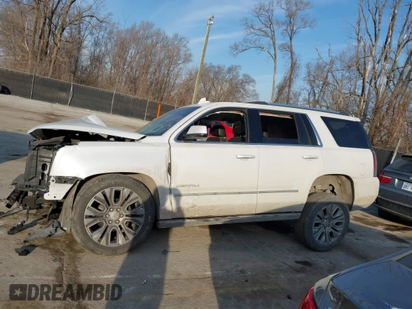 2017 GMC Yukon Denali with VIN 1GKS2CKJ4HR310822, listed as a IAAI auction lot 41666174 with 101,388 mi miles. Bid and sale history available at carsss.com. Image 14.