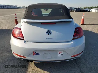 2018 Volkswagen Beetle S z VIN 3VW5DAAT8JM517356, wystawiony jako Copart lot #52709705 z przebiegiem 36 437 mil mil oraz Szkoda całkowita • Salvage title. Historia ofert i sprzedaży dostępna na DreamBid. Obrazek 6.