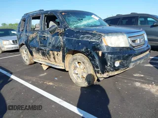 2011 Honda Pilot EX-L z VIN 5FNYF3H73BB047449, wystawiony jako IAAI lot #42006665 z przebiegiem 98 418 mil mil oraz . Historia ofert i sprzedaży dostępna na DreamBid. Obrazek 1.