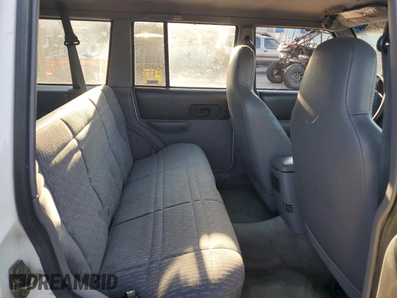 1997 Jeep Cherokee Sport with VIN 1J4FT68S9VL547391, listed as a Copart auction lot 70447484 with 250,171 mi miles and Salvage Title. Bid and sale history available at carsss.com. Image 11.