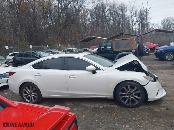 2015 Mazda Mazda6 i Touring with VIN JM1GJ1V66F1173314, listed as a IAAI auction lot 41101860 with 160,338 mi miles. Bid and sale history available at carsss.com. Image 12.