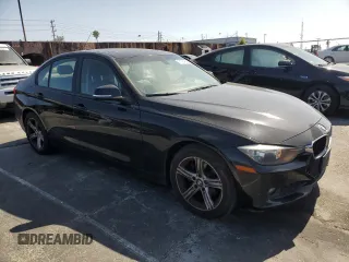 2014 BMW 3 Series 320i with VIN WBA3B1C56EP678722, listed as a Copart auction lot 61504625 with 158,903 mi miles and Clean title. Bid and sale history available at DreamBid. Image 4.