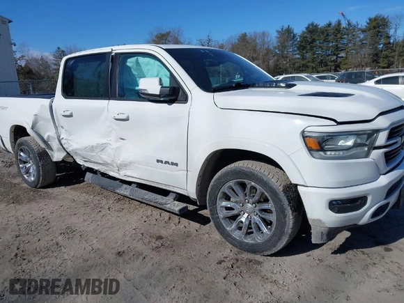 2022 Ram 1500 Laramie with VIN 1C6SRFJTXNN237199, listed as a IAAI auction lot 41705536 with 35,143 mi miles and . Bid and sale history available at DreamBid. Image 1.