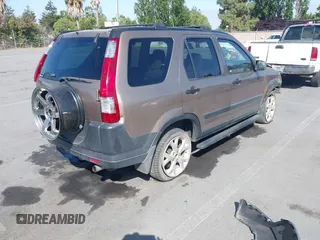 2002 Honda CR-V EX z VIN JHLRD78852C086649, wystawiony jako IAAI lot #42473495 z przebiegiem 238 401 mil mil oraz . Historia ofert i sprzedaży dostępna na DreamBid. Obrazek 4.