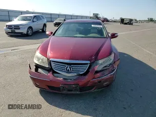 2007 Acura RL Technology z VIN JH4KB16677C004641, wystawiony jako Copart lot #59049755 z przebiegiem 176 704 mil mil oraz Szkoda całkowita • Salvage title. Historia ofert i sprzedaży dostępna na DreamBid. Obrazek 13.