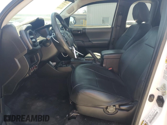 2016 Toyota Tacoma SR with VIN 5TFRX5GN9GX058319, listed as a Copart auction lot 55653195 with 177,658 mi miles and Salvage title. Bid and sale history available at DreamBid. Image 7.