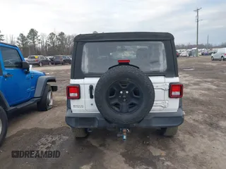 2021 Jeep Wrangler Sport S with VIN 1C4GJXAN6MW677281, listed as a IAAI auction lot 40814351 with 55,360 mi miles and . Bid and sale history available at DreamBid. Image 16.