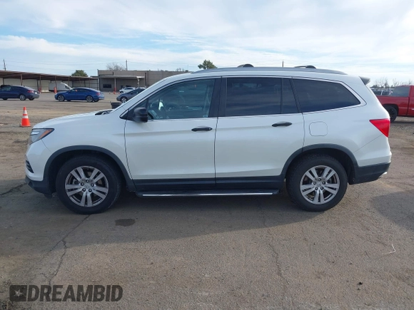 2016 Honda Pilot LX with VIN 5FNYF6H1XGB009768, listed as a IAAI auction lot 41666109 with 137,733 mi miles. Bid and sale history available at carsss.com. Image 14.