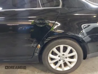 2010 Volkswagen Jetta SE z VIN 3VWRZ7AJ3AM157188, wystawiony jako IAAI lot #41816829 z przebiegiem 188 180 mil mil oraz . Historia ofert i sprzedaży dostępna na DreamBid. Obrazek 18.