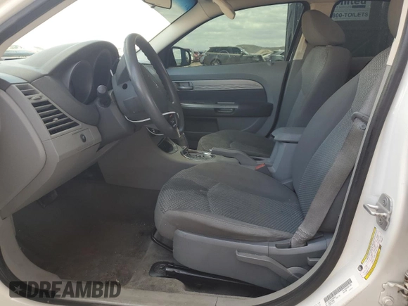 2007 Chrysler Sebring z VIN 1C3LC46K47N556611, wystawiony jako Copart lot #53664705 z przebiegiem 203 653 mil mil oraz Szkoda całkowita • Salvage title. Historia ofert i sprzedaży dostępna na DreamBid. Obrazek 7.
