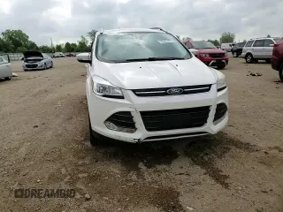 2014 Ford Escape Titanium с VIN 1FMCU0J93EUC35437, выставлен на аукционе Copart как лот 56299395 с пробегом 130 770 миль миль и Списание • Salvage title. История ставок и продаж доступна на DreamBid. Изображение 13.
