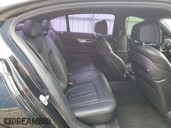2019 BMW 7 Series 740i with VIN WBA7E2C57KB217455, listed as a Copart auction lot 69580773 with 74,717 mi miles and . Bid and sale history available at DreamBid. Image 10.
