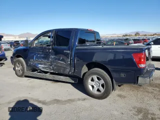 2010 Nissan Titan LE with VIN 1N6AA0EC5AN314233, listed as a Copart auction lot 84234574 with 175,110 mi miles and Salvage Title. Bid and sale history available at carsss.com. Image 2.