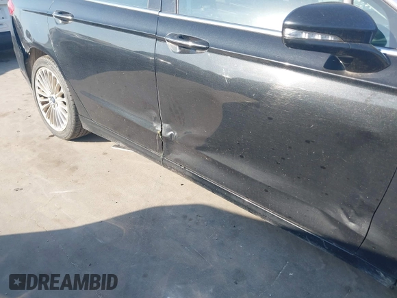 2014 Ford Fusion Titanium with VIN 3FA6P0K94ER115795, listed as a IAAI auction lot 42230295 with 266,277 mi miles and . Bid and sale history available at DreamBid. Image 13.