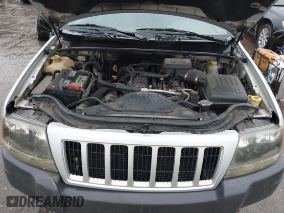 2004 Jeep Grand Cherokee Laredo z VIN 1J4GW48S64C132172, wystawiony jako IAAI lot #42163524 z przebiegiem 170 952 mil mil oraz . Historia ofert i sprzedaży dostępna na DreamBid. Obrazek 10.