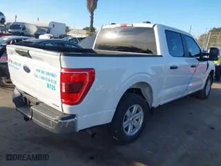 2023 Ford F-150 XL with VIN 1FTEW1CP5PKG21641, listed as a IAAI auction lot 41395265 with 9,076 mi miles. Bid and sale history available at carsss.com. Image 4.
