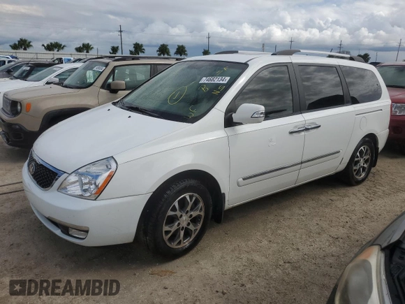 2014 Kia Sedona EX with VIN KNDMH4C70E6568487, listed as a Copart auction lot 74682134 with 69,977 mi miles and Salvage Title. Bid and sale history available at carsss.com. Image 1.