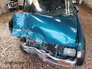 1997 Nissan Frontier XE with VIN 1N6SD16Y2VC338776, listed as a Copart auction lot 45020595 with 243,030 mi miles and Salvage title. Bid and sale history available at DreamBid. Image 12.
