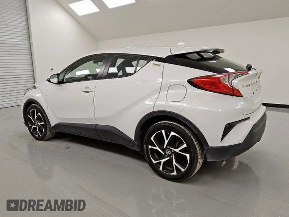2021 Toyota C-HR LE z VIN NMTKHMBX0MR120577, wystawiony jako Copart lot #57019105 z przebiegiem 152 488 mil mil oraz Czysty tytuł • Clean title. Historia ofert i sprzedaży dostępna na DreamBid. Obrazek 2.