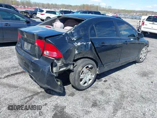 2007 Honda Civic Sdn LX with VIN 1HGFA16577L134935, listed as a IAAI auction lot 41975087 with 255,338 mi miles. Bid and sale history available at carsss.com. Image 4.