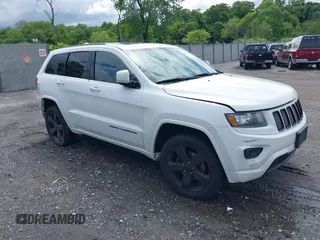 2015 Jeep Grand Cherokee Altitude z VIN 1C4RJFAG5FC224665, wystawiony jako IAAI lot #42284310 z przebiegiem 129 896 mil mil oraz . Historia ofert i sprzedaży dostępna na DreamBid. Obrazek 1.