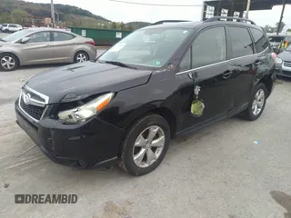 2014 Subaru Forester 2.5i Limited with VIN JF2SJAJC9EH517196, listed as a IAAI auction lot 31343919 with 71,396 mi miles. Bid and sale history available at carsss.com. Image 6.