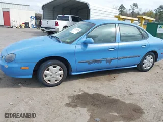 1999 Ford Taurus SE with VIN 1FAFP53U2XA154351, listed as a IAAI auction lot 41943794 with 125,085 mi miles. Bid and sale history available at carsss.com. Image 6.