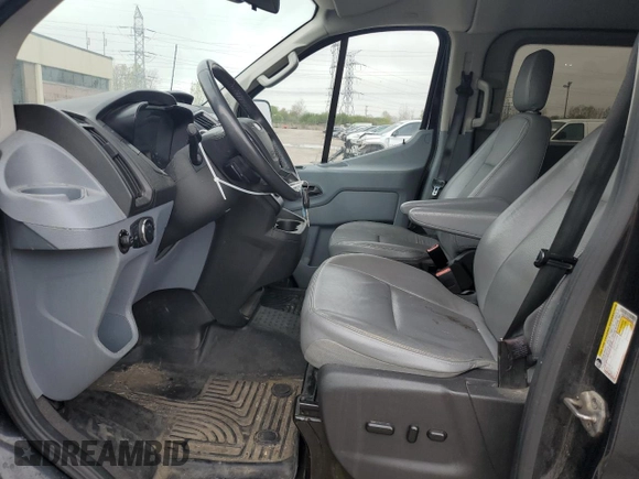 2015 Ford Transit Passenger XL with VIN 1FMZK1YG6FKA05480, listed as a Copart auction lot 55857055 with 218,510 mi miles and Clean title. Bid and sale history available at DreamBid. Image 7.