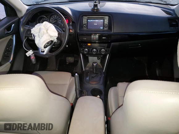 2014 Mazda CX-5 Grand Touring with VIN JM3KE4DY9E0366667, listed as a Copart auction lot 88707365 with 140,115 mi miles and Salvage Title. Bid and sale history available at carsss.com. Image 8.