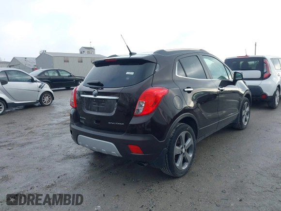 2013 Buick Encore Leather with VIN KL4CJCSB0DB144646, listed as a IAAI auction lot 41668384 with 122,082 mi miles and . Bid and sale history available at carsss.com. Image 4.
