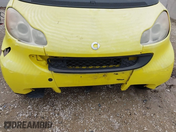 2008 Smart fortwo Pure z VIN WMEEJ31X58K163695, wystawiony jako IAAI lot #41967790 z przebiegiem 133 970 mil mil oraz . Historia ofert i sprzedaży dostępna na DreamBid. Obrazek 13.
