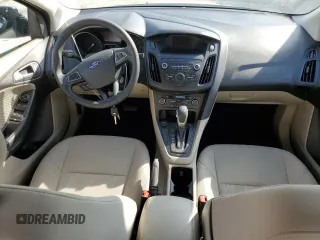 2018 Ford Focus SE z VIN 1FADP3FE8JL331853, wystawiony jako Copart lot #74013984 z przebiegiem 73 237 mil mil oraz Szkoda całkowita • Salvage title. Historia ofert i sprzedaży dostępna na DreamBid. Obrazek 8.