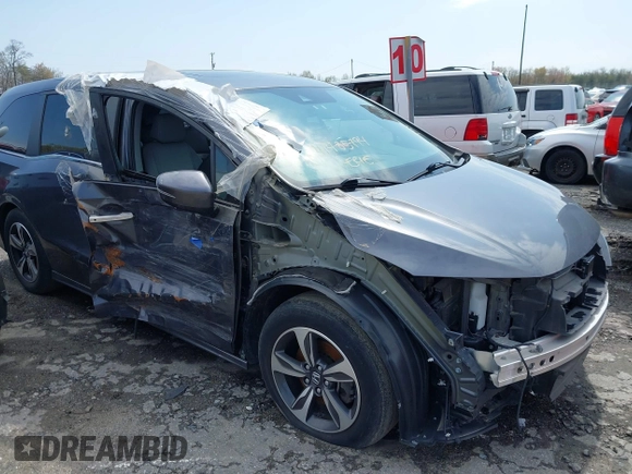 2018 Honda Odyssey Touring with VIN 5FNRL6H8XJB029570, listed as a IAAI auction lot 41485794 with 77,601 mi miles. Bid and sale history available at carsss.com. Image 6.