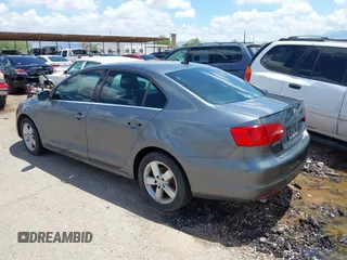 2012 Volkswagen Jetta TDI w/Premium with VIN 3VWLL7AJ1CM307485, listed as a IAAI auction lot 42384300 with 118,958 mi miles and . Bid and sale history available at DreamBid. Image 3.