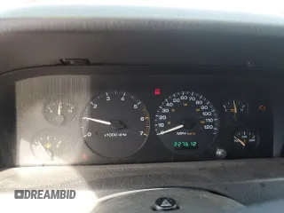 2004 Jeep Grand Cherokee Laredo z VIN 1J4GW48S24C220989, wystawiony jako Copart lot #56759465 z przebiegiem 227 612 mil mil oraz Szkoda całkowita • Salvage title. Historia ofert i sprzedaży dostępna na DreamBid. Obrazek 9.