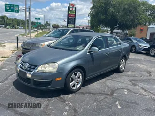 2006 Volkswagen Jetta z VIN 3VWRG81K46M724245, wystawiony jako Copart lot #57293785 z przebiegiem 212 639 mil mil oraz Czysty tytuł • Clean title. Historia ofert i sprzedaży dostępna na DreamBid. Obrazek 2.