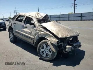 2005 Jeep Grand Cherokee Laredo z VIN 1J4HR48N65C517657, wystawiony jako Copart lot #58774685 z przebiegiem Nie podano mil oraz Szkoda całkowita • Salvage title. Historia ofert i sprzedaży dostępna na DreamBid. Obrazek 14.