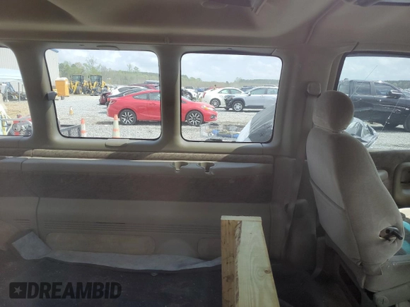 2002 GMC Savana z VIN 1GDFG65R221108418, wystawiony jako Copart lot #51793385 z przebiegiem 150 466 mil mil oraz Szkoda całkowita • Salvage title. Historia ofert i sprzedaży dostępna na DreamBid. Obrazek 11.